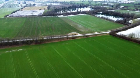 View from above on the German motorway A7 with some windmills for renewable Stock Footage 345761740