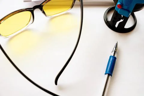 A view from above on glasses located on a table with paper and a seal Stock Photos
