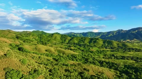 View from above of a green mountain pass. Видео 330039609