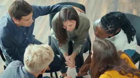 View From Above. A Group of People Sitting in a Circle During a Group Therapy Stock Footage 169767902