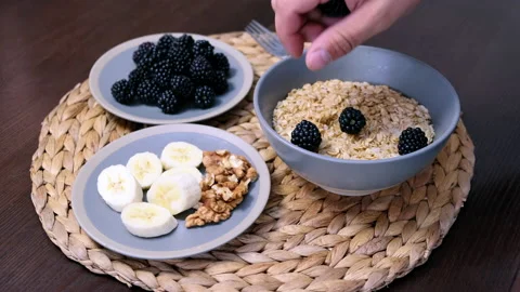 View from above. Hand making breakfast with Stock Footage 202593326
