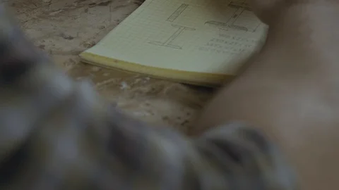 View from above. Hands of architect working on project of wooden furniture Video stock 102111618