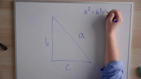 View from above of hands drawing triangle on white board Stock Footage 232798710