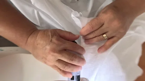 View Above Hands of Female Tailor Working Sewing Machine 스톡 동영상 339976756