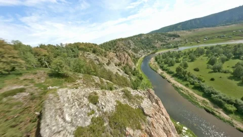 View from above on high mountains with steep slopes. The concept of rock Stock Footage 156369829