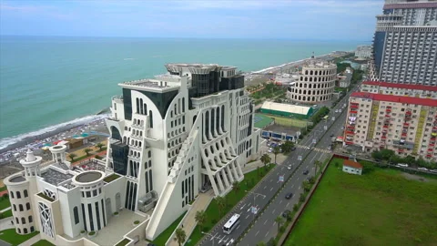 View from above, the hotel is located next to the coast and palm trees Stock Footage 94139562