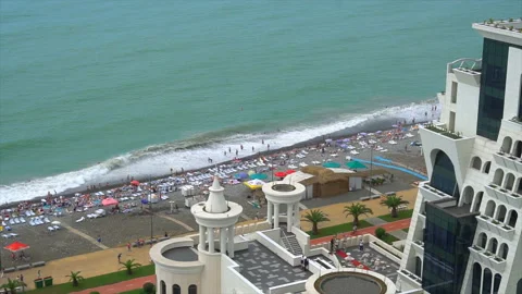 View from above, the hotel is located next to the coast and palm trees Stock-Footage 94139802