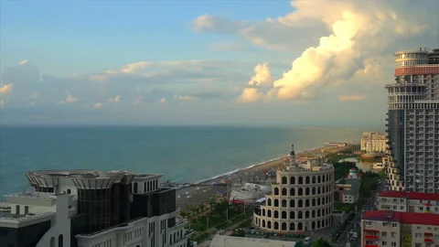 View from above, the hotel is located next to the coast and palm trees Stock Footage 94140587