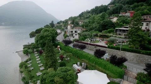 View from above of Lake Como and Italian village in Bellagio Stock Footage 232003298