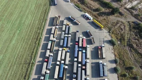 View from above on a large queue of trucks waiting at the port terminal. Video stock 160755855
