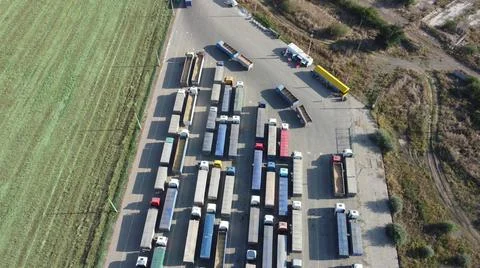 View from above on a large queue of trucks waiting at the port terminal. 스톡 사진