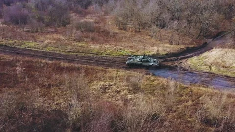 View from Above.The Main Tank is Moving Across the Field. Stock Footage 169808459