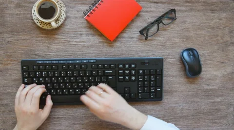 View from above of man's hands typing Stock Footage 60787096