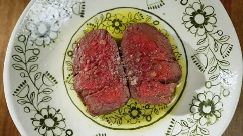 View from above on medium rare beef on wooden table Stock Footage 275075994