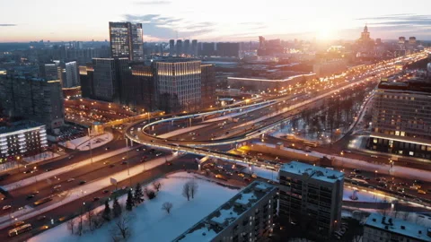 View from above to Moscow multi-level highway in winter lit by the sunset. Stock Footage 150238745