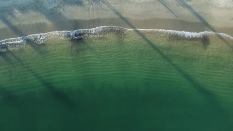View from above over a light sand beach Stock Footage 330884272