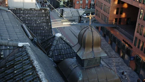 View from above over rooftops on footbridge at historic Holzhafen Stock Footage 196104951