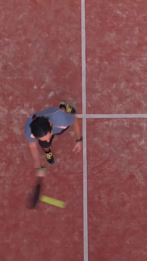 View from above of a paddle tennis player who is playing a match. Stock Footage 310104426