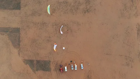 View from above of parachutist getting ready for paramotor extreme sports Video stock 116565973