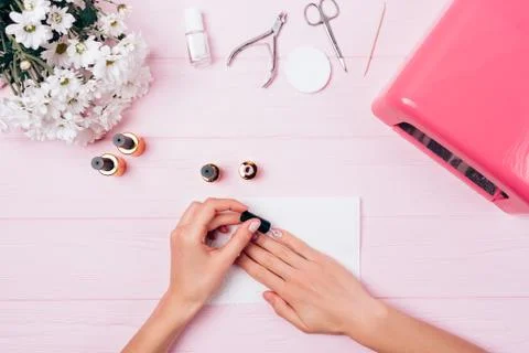 View from above process of painting nails Stock Photos