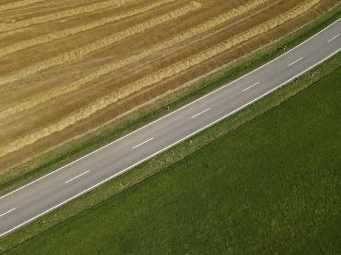 View from above of a road between fields in the landscape Stock Photos