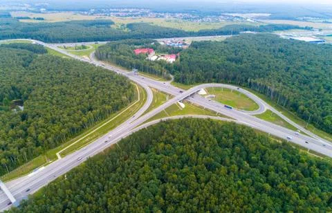 A view from above of the road, road junctions and cars. Stock Photos