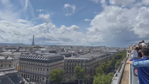 View from above with the roofs in perspective, Paris, time lapse Stock Footage 313919953