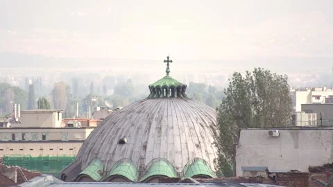 View above the rooftops of Sofia with the dome of the Church of St Paraskeva Video stock 335434683