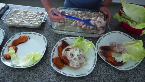 View from above serving various dishes of Ceviche with sweet potato, lettuce and Video stock 178220518