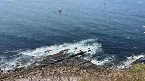 View from above on a small ship in the sea  Stock Footage 313629608