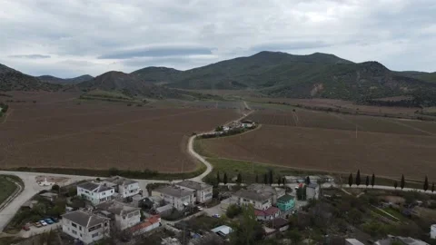 View from above on a small town in a mountainous area. Beautiful cityscape Stock Footage 159670656