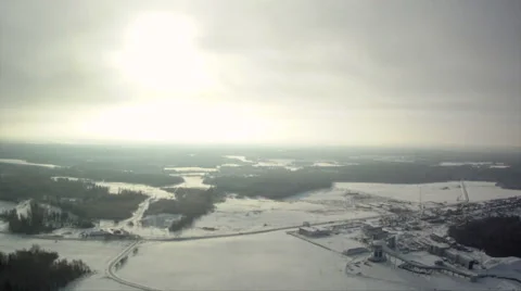 View from above of snow-covered fields and forests Stock Footage 45259808