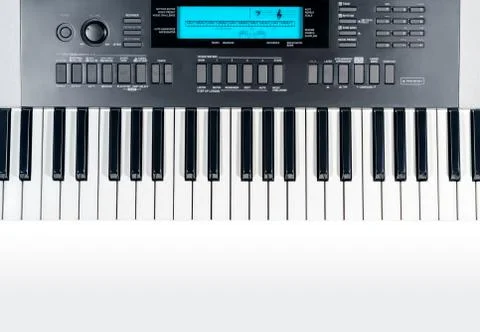 View from above of a synthesizer isolated on a gradient light Stock Photos