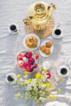 View from above on table with samovar, coffee cups, sweets Stock Photos