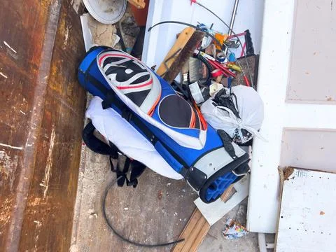 View from above at the throw away golf club bag in dumpster- recycling old 스톡 사진