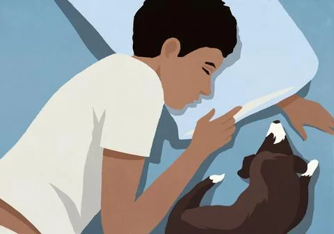 View from above of tired man sleeping next to dog in bed at night Ilustração Stock