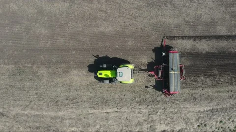 View from above as a tractor plows a field Video stock 209935635