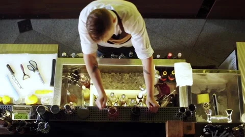 View from above. Two young people sitting in the bar and clinking glasses Stock Footage 67361365