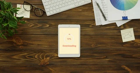 View from above on the vertical white tablet device an installation of the Stock Footage 95062225