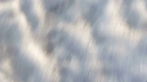A view from above of waves, foam and colored stones. Pebble beach Stock Footage 80668330