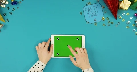 View from above on the white horizontal tablet computer lying on the blue table 스톡 동영상 89314013