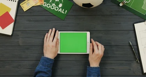 View from above on the white horizontal tablet computer on the dark grey wooden Video stock 96331365