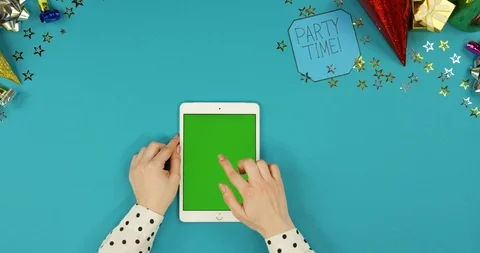 View from above on the white vertical tablet computer lying on the blue table Stock Footage 89314249