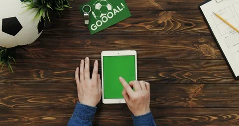 View from above on the white vertical tablet computer with chroma key screen in Stock-Footage 96319352