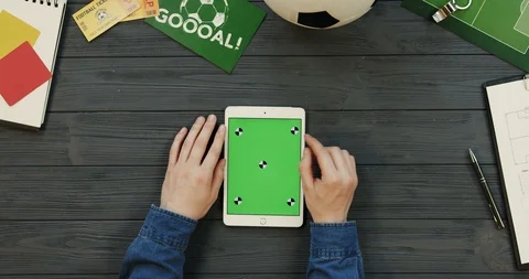 View from above on the white vertical tablet computer on the dark grey wooden Stock Footage 96330986