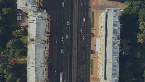 View from above a wide two-way road with few cars Video stock 112390300