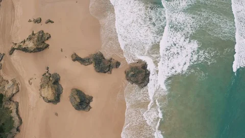 View from above of wide yellow sandy beach and waves Stock Footage 102930410
