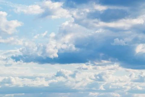 View on abstract clouds in the sky. Cloudscape photography on a daytime. Stock Photos