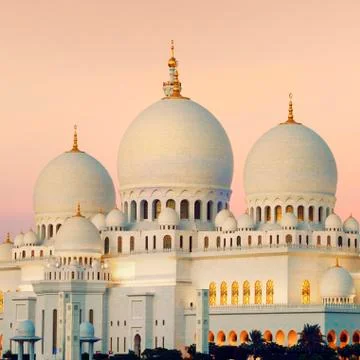 View of abu dhabi sheikh zayed mosque at sunset Stock Photos