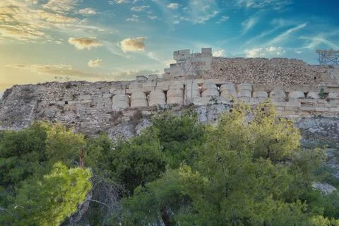 View of the  Acropolis surrounded by ancient architecture in Athens, Greece.. Stock Photos